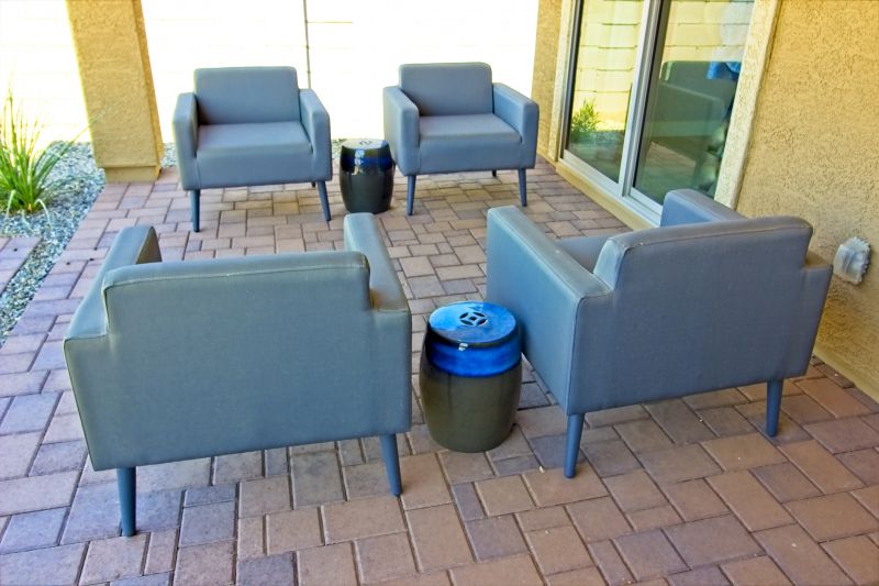 Modern paver patio with seating area